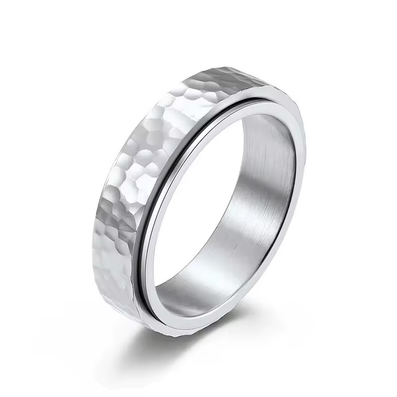 stainless steel rotating ring with hand-beaten irregular patterns, niche stainless steel hand jewelry