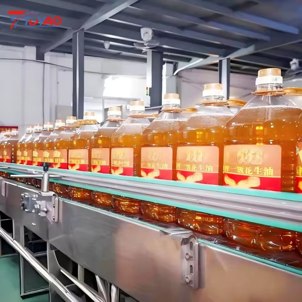 Small Bottled Oil Packaging Machinery 500ml 1L 2L 5L Automatic Piston Filling Machine 2000-4000BPH Factory Price