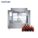 Multi-purpose Linear Gravity Liquid Filling Machine Fit Glass & Plastic Bottles for Beverage Daily Chemical Industry