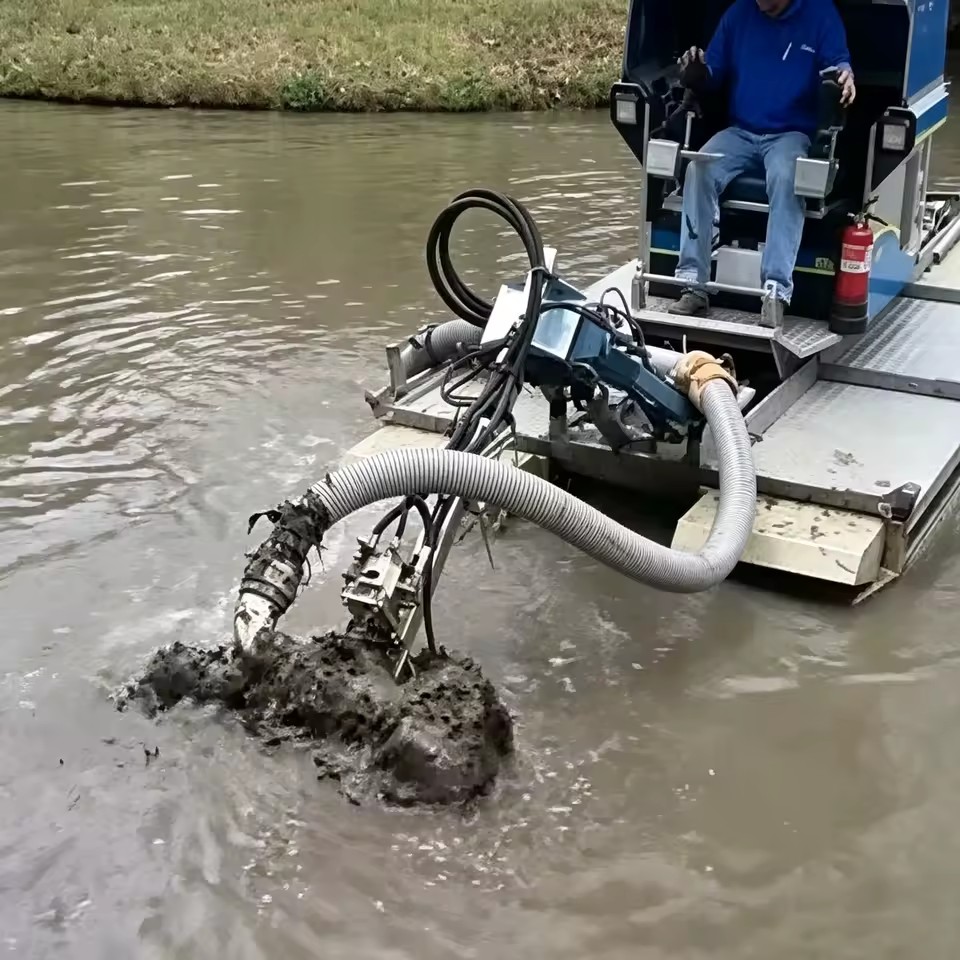 Small Amphibious Multifunctional Dredger for Urban and Restricted Water Areas